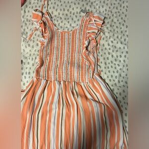 Small a new day stripped coral dress. Never worn. Ruffled sleeves. Long dress.